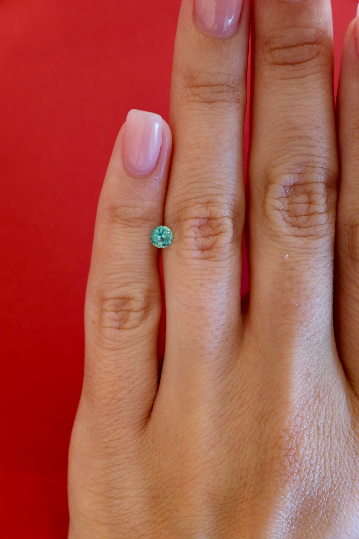 Bespoke 0.27 Carat Round Paraíba Tourmaline